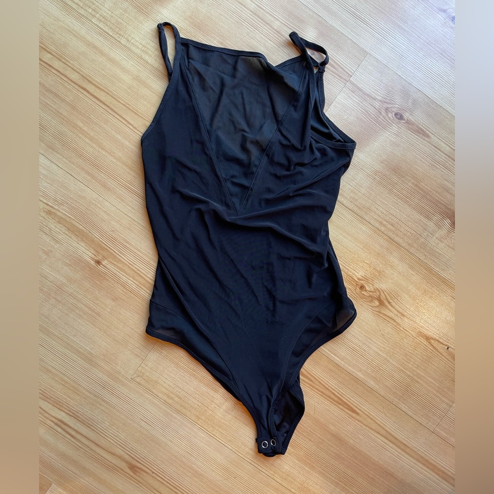 Black bodysuit with V neck mesh detail
